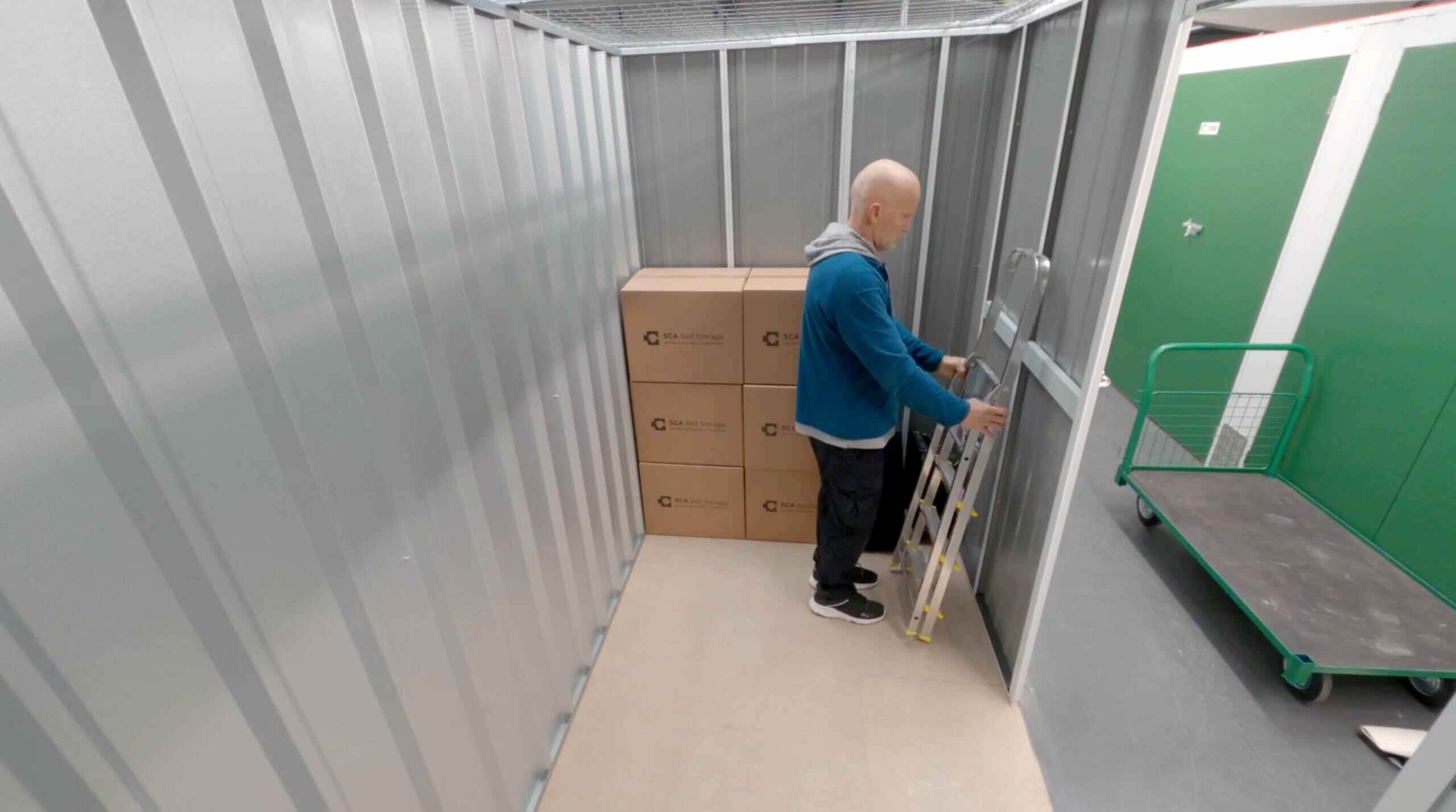 Customer filling up a safe and secure storage unit