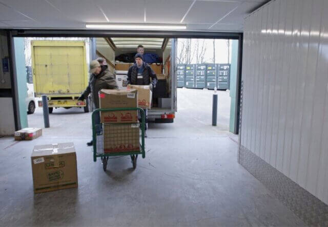 Removal team entering the storage facility