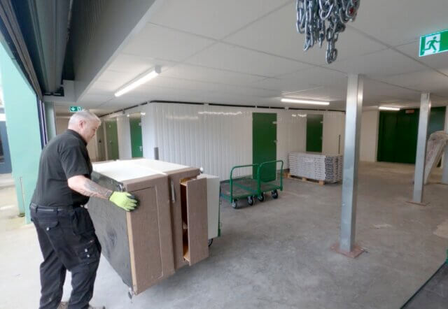 Removal man entering the storage facility